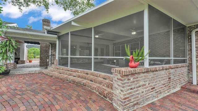323 E Belvedere St, Lakeland, FL 33803 - view of patio featuring a sunroom