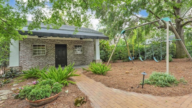 323 E Belvedere St, Lakeland, FL 33803 - view of yard with a playground