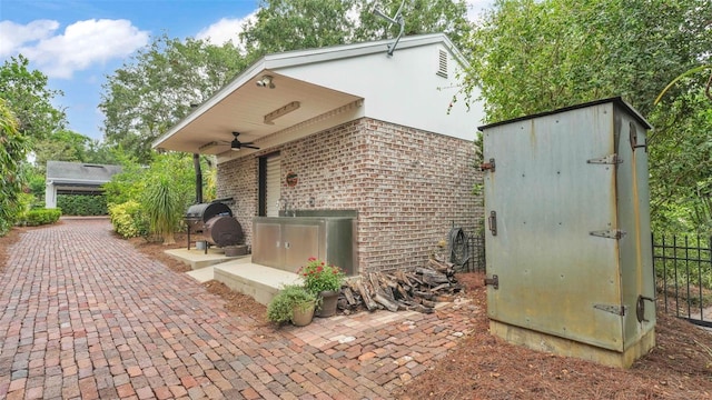 323 E Belvedere St, Lakeland, FL 33803 - view of patio featuring a ceiling fan and a grill