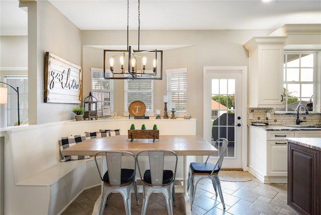5425 Charlin Ave, Lakeland, FL 33810 - dining room featuring a chandelier