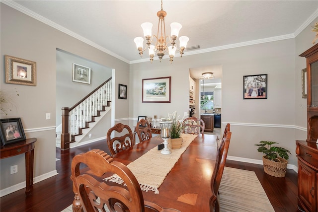5425 Charlin Ave, Lakeland, FL 33810 - dining area with dark wood finished floors, stairs, ornamental molding, a chandelier, and baseboards