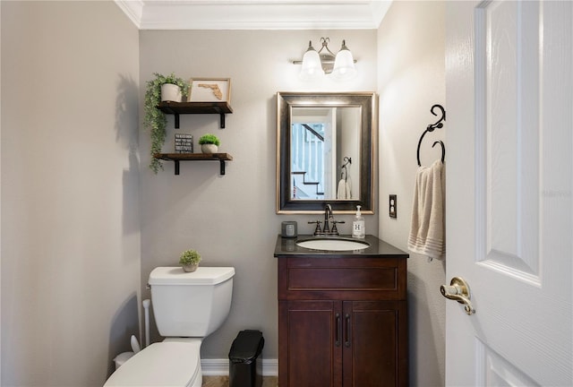 5425 Charlin Ave, Lakeland, FL 33810 - bathroom with toilet, vanity, and ornamental molding