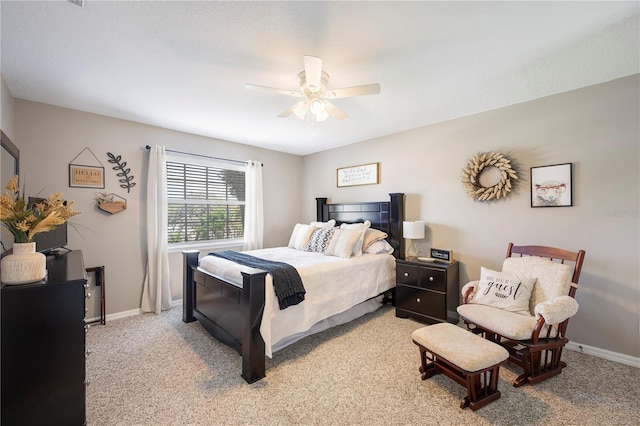5425 Charlin Ave, Lakeland, FL 33810 - bedroom featuring light colored carpet, baseboards, and a ceiling fan