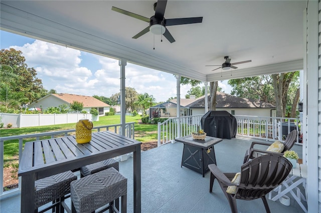 5425 Charlin Ave, Lakeland, FL 33810 - view of patio with a ceiling fan, area for grilling, a residential view, and outdoor dining space