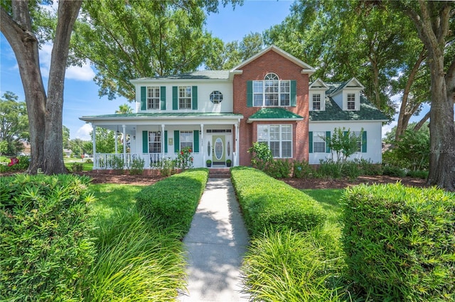 5425 Charlin Ave, Lakeland, FL 33810 - view of front of property featuring covered porch