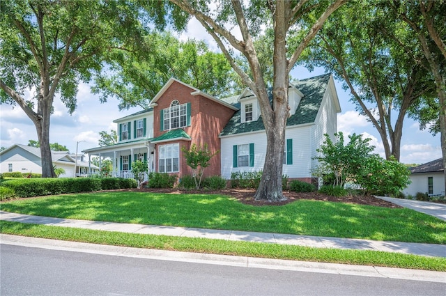 5425 Charlin Ave, Lakeland, FL 33810 - traditional-style home featuring a front yard