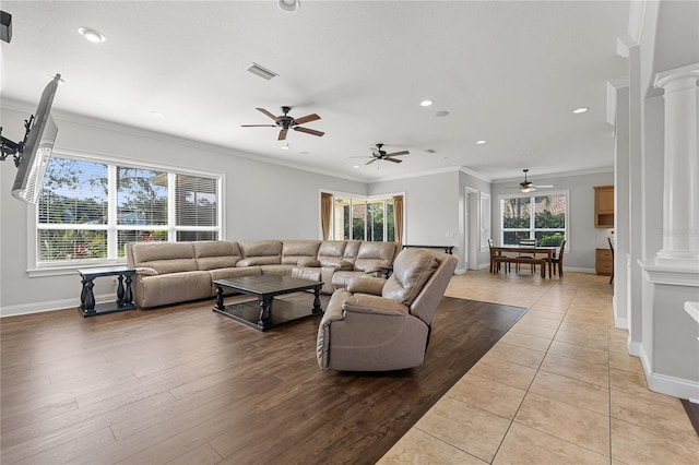 6542 Eagle Ridge Way, Lakeland, FL 33813 - living room with decorative columns, ceiling fan, ornamental molding, baseboards, and recessed lighting