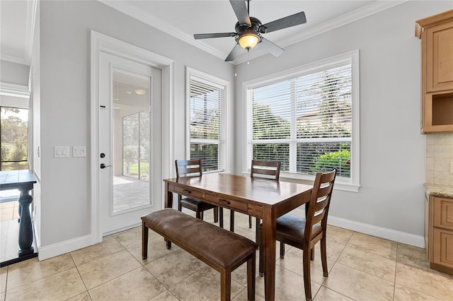 6542 Eagle Ridge Way, Lakeland, FL 33813 - dining room featuring crown molding, baseboards, a ceiling fan, and light tile patterned floors