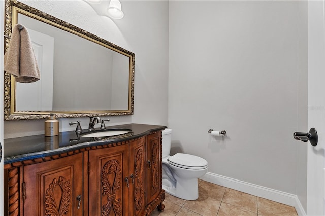 6542 Eagle Ridge Way, Lakeland, FL 33813 - bathroom with toilet, baseboards, vanity, and tile patterned floors