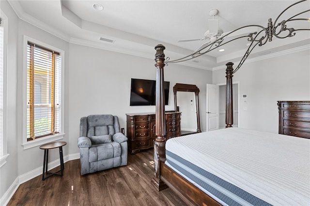 6542 Eagle Ridge Way, Lakeland, FL 33813 - bedroom featuring a tray ceiling, dark wood finished floors, ornamental molding, recessed lighting, and baseboards