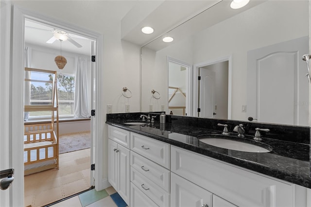 6542 Eagle Ridge Way, Lakeland, FL 33813 - bathroom with double vanity and ceiling fan