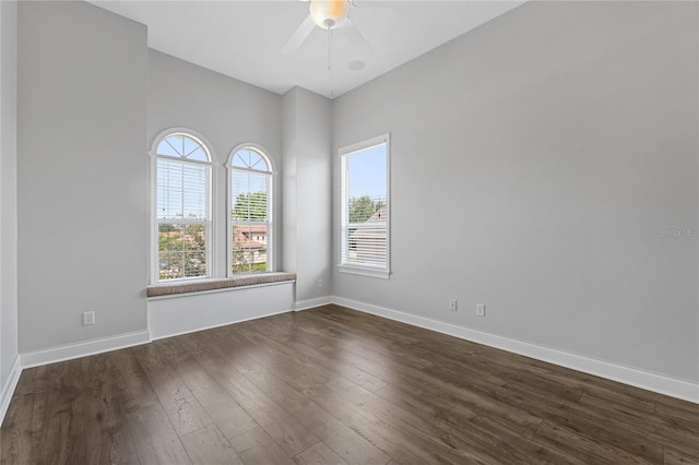 6542 Eagle Ridge Way, Lakeland, FL 33813 - spare room with ceiling fan, dark wood-type flooring, and baseboards