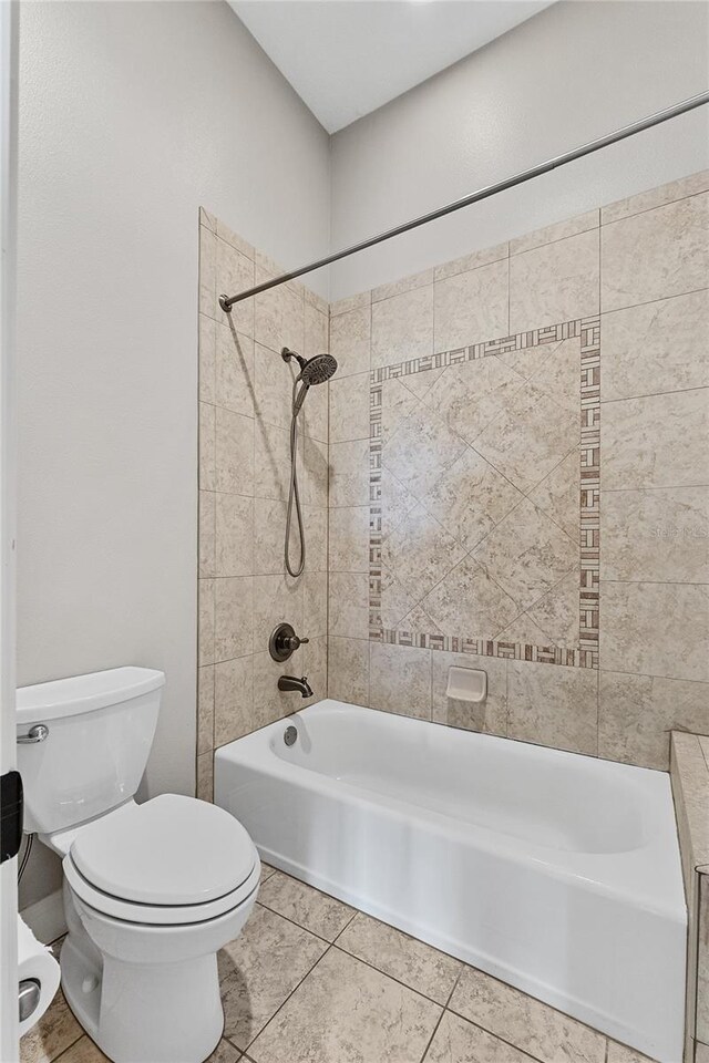 6542 Eagle Ridge Way, Lakeland, FL 33813 - full bathroom with toilet, shower / tub combination, and tile patterned floors