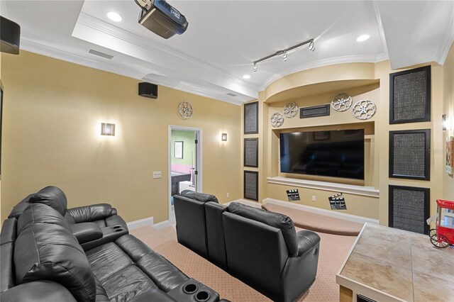 6542 Eagle Ridge Way, Lakeland, FL 33813 - carpeted home theater featuring ornamental molding, track lighting, baseboards, recessed lighting, and built in shelves