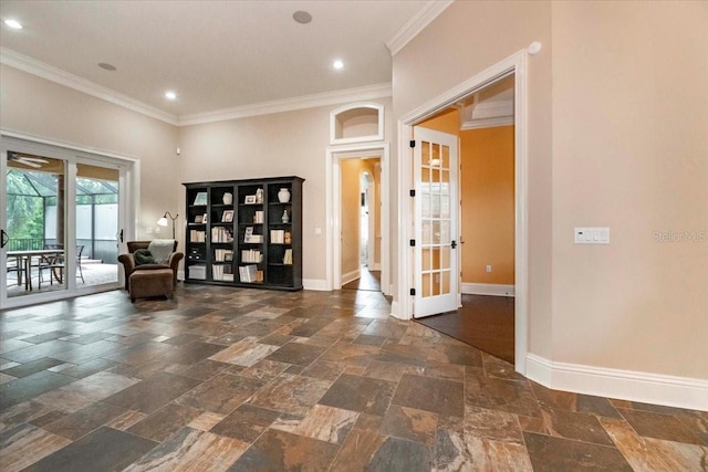 6357 Ashley Dr, Lakeland, FL 33813 - entryway featuring stone tile flooring, baseboards, ornamental molding, recessed lighting, and french doors