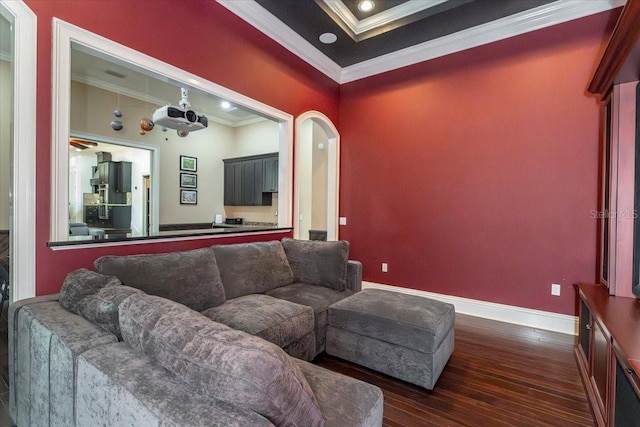 6357 Ashley Dr, Lakeland, FL 33813 - living area with ornamental molding, dark wood-style flooring, arched walkways, baseboards, and recessed lighting