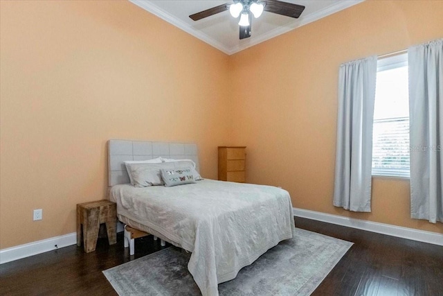 6357 Ashley Dr, Lakeland, FL 33813 - bedroom with ornamental molding, baseboards, dark wood-style flooring, and a ceiling fan