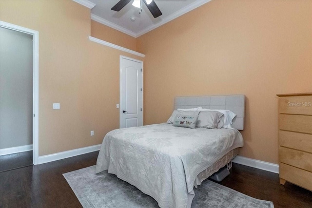 6357 Ashley Dr, Lakeland, FL 33813 - bedroom featuring crown molding, wood finished floors, baseboards, and a ceiling fan