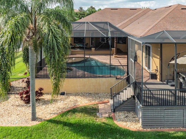 6357 Ashley Dr, Lakeland, FL 33813 - view of pool featuring a patio area and a lanai