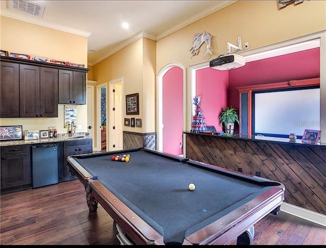 6357 Ashley Dr, Lakeland, FL 33813 - playroom featuring ornamental molding, dark wood finished floors, billiards, arched walkways, and recessed lighting