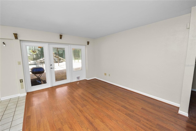 5425 Lewellyn Rd, Lakeland, FL 33810 - empty room with wood finished floors and baseboards