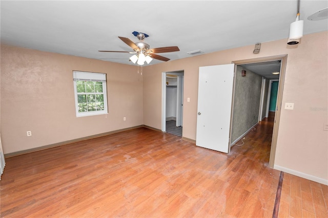 5425 Lewellyn Rd, Lakeland, FL 33810 - empty room with ceiling fan, light wood-style floors, and baseboards