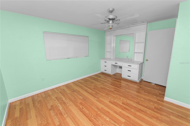 5425 Lewellyn Rd, Lakeland, FL 33810 - unfurnished bedroom featuring light wood-style floors, baseboards, and ceiling fan
