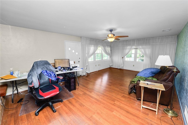 5425 Lewellyn Rd, Lakeland, FL 33810 - living area with an office area, ceiling fan, and wood finished floors
