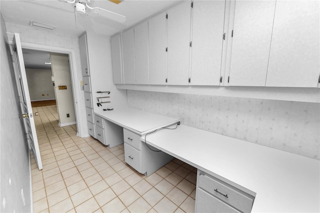 5425 Lewellyn Rd, Lakeland, FL 33810 - unfurnished office featuring built in desk and light tile patterned flooring