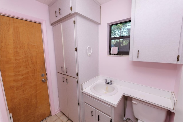 5425 Lewellyn Rd, Lakeland, FL 33810 - bathroom featuring vanity, toilet, and tile patterned floors