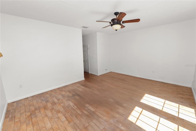 5425 Lewellyn Rd, Lakeland, FL 33810 - spare room featuring light wood finished floors, baseboards, and ceiling fan