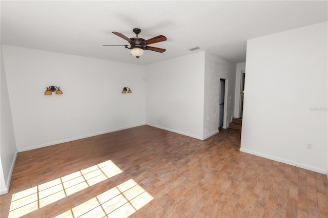 5425 Lewellyn Rd, Lakeland, FL 33810 - spare room with light wood-style floors, ceiling fan, and baseboards