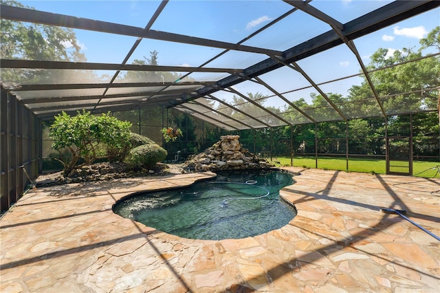 5425 Lewellyn Rd, Lakeland, FL 33810 - swimming pool with a patio, a lanai, and a fenced backyard