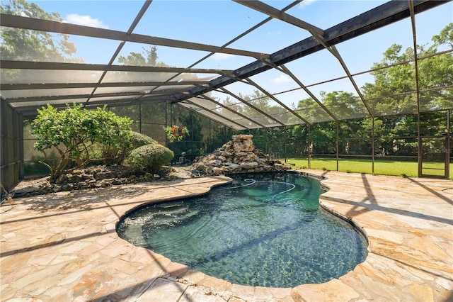 5425 Lewellyn Rd, Lakeland, FL 33810 - outdoor pool featuring a patio and glass enclosure