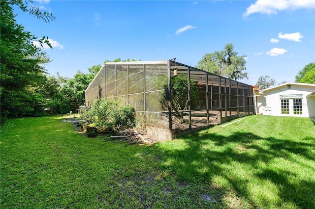 5425 Lewellyn Rd, Lakeland, FL 33810 - rear view of property featuring french doors and a yard