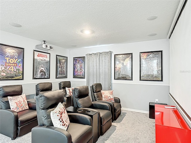 carpeted cinema room with a textured ceiling and baseboards