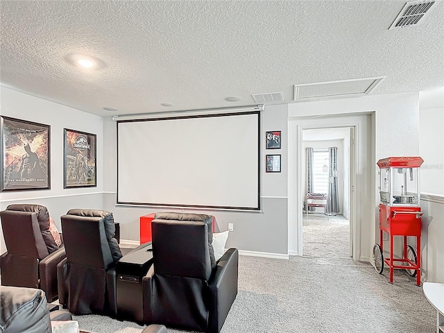 home theater featuring a textured ceiling and carpet floors