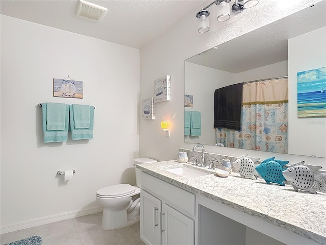 full bathroom featuring tile patterned floors, toilet, vanity, baseboards, and a shower with curtain
