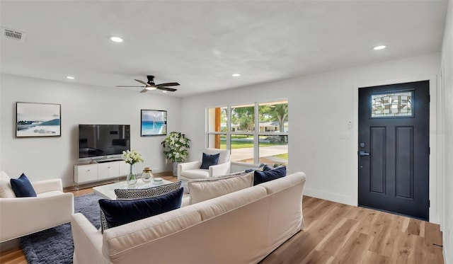 6543 Tula Ln, Lakeland, FL 33809 - living area with recessed lighting, ceiling fan, light wood finished floors, and baseboards