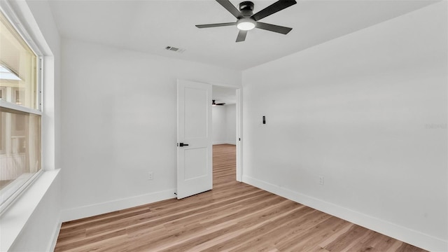6543 Tula Ln, Lakeland, FL 33809 - spare room featuring a ceiling fan, baseboards, and light wood-style flooring