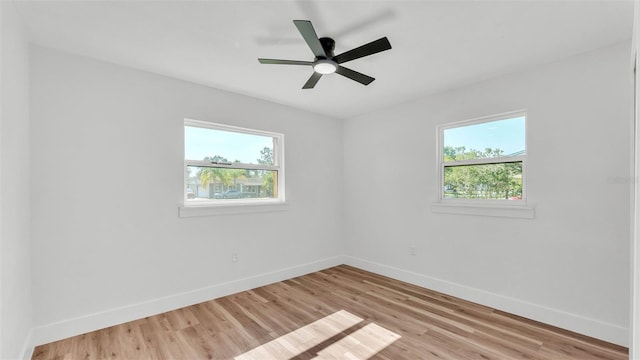 6543 Tula Ln, Lakeland, FL 33809 - unfurnished room featuring baseboards, light wood-style floors, and a ceiling fan