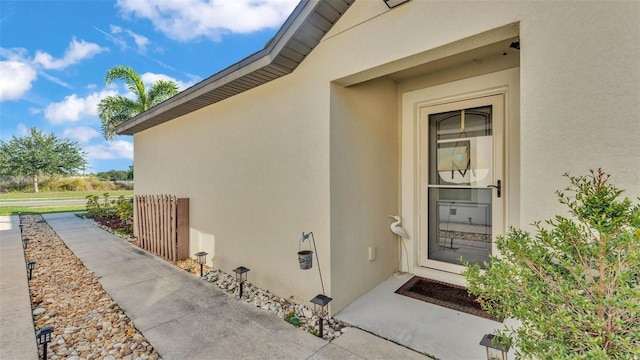 2293 Caspian Dr, Lakeland, FL 33805 - view of exterior entry with stucco siding