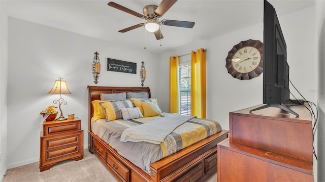 2293 Caspian Dr, Lakeland, FL 33805 - bedroom with light colored carpet, baseboards, and a ceiling fan