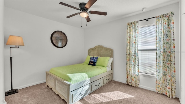 2293 Caspian Dr, Lakeland, FL 33805 - bedroom with carpet, baseboards, and ceiling fan
