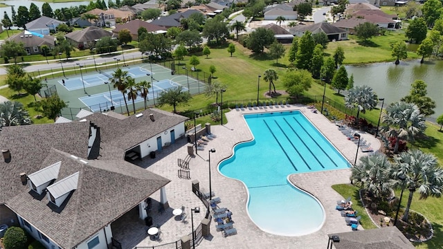 2293 Caspian Dr, Lakeland, FL 33805 - community pool featuring a water view and a residential view