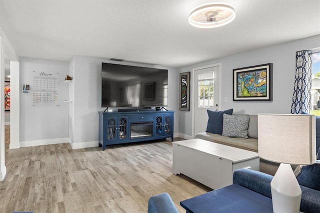 3810 Harrelson Rd, Lakeland, FL 33810 - living area with baseboards and wood finished floors
