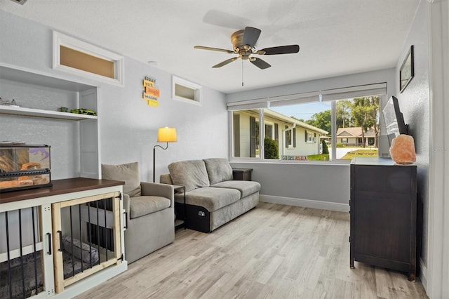 3810 Harrelson Rd, Lakeland, FL 33810 - living room featuring wood finished floors, ceiling fan, and baseboards