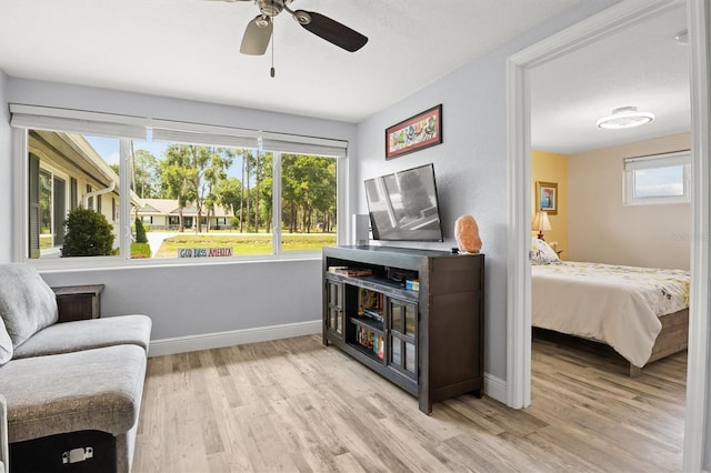 3810 Harrelson Rd, Lakeland, FL 33810 - sitting room with light wood-style floors, a ceiling fan, and baseboards