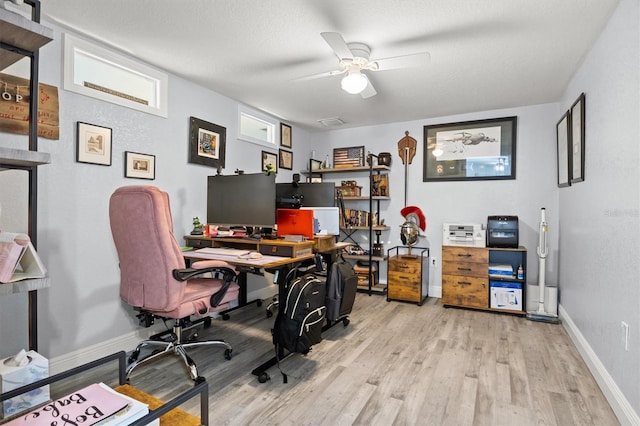 3810 Harrelson Rd, Lakeland, FL 33810 - office area featuring wood finished floors, ceiling fan, baseboards, and a textured ceiling
