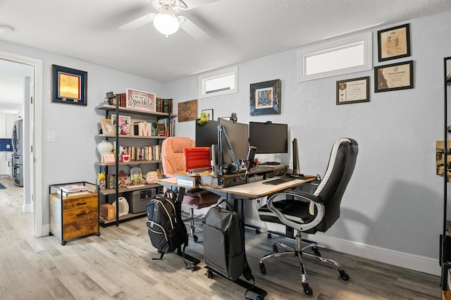 3810 Harrelson Rd, Lakeland, FL 33810 - office area featuring ceiling fan, wood finished floors, and baseboards
